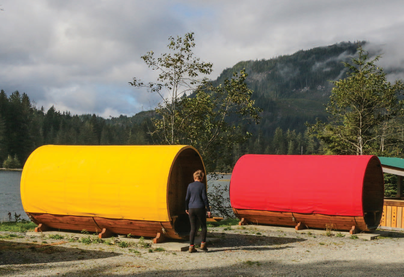 Colourful sleeping cabins at the Pacheedaht Nation's campsite. Photo by Hans Tammemagi.