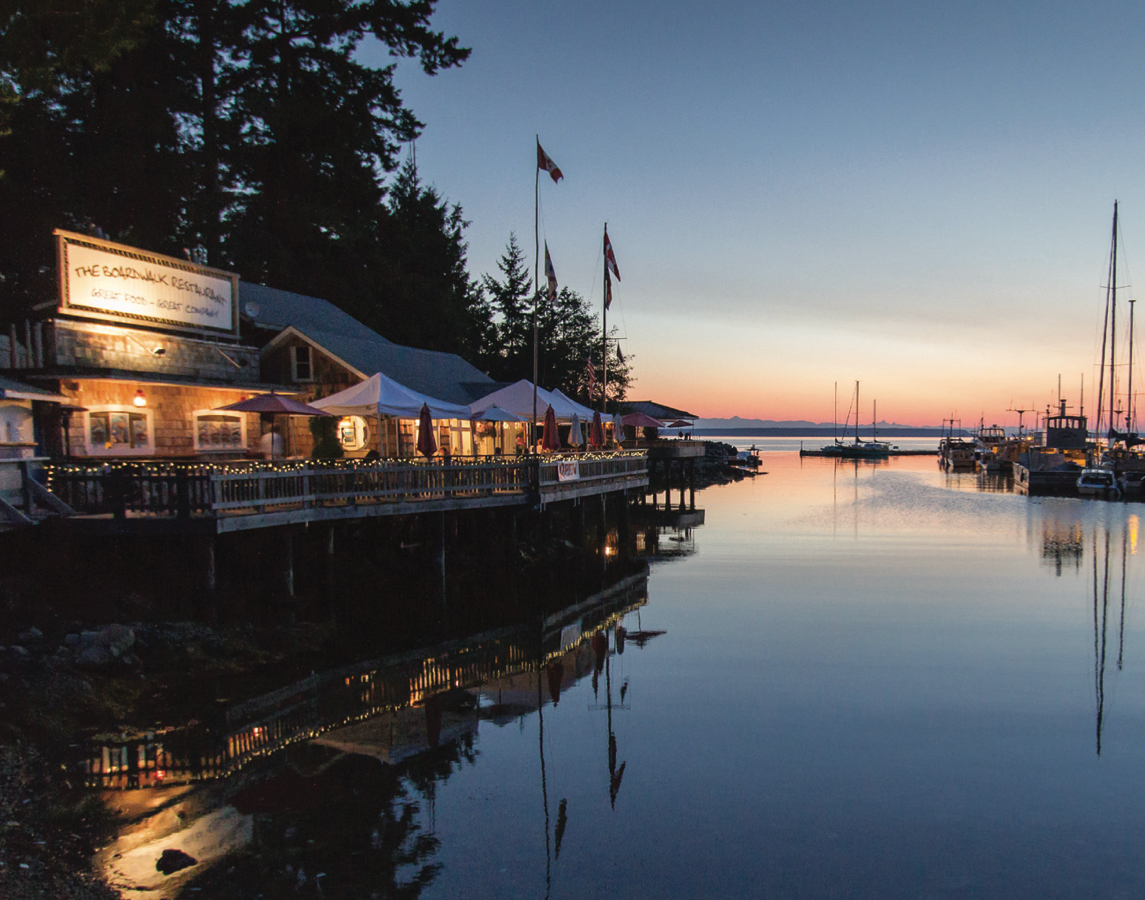 A beautiful evening view of the Lund Small Craft Harbour and the Boardwalk Restaurant. Photo by Sunshine Coast Tourism/Brian K. Smith.