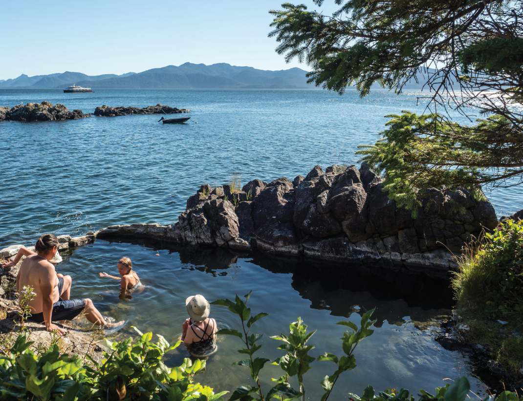 Relaxing in the pools at Gandll K’in Gwaay.yaay, Hotspring Island. Photo By Diane Selkirk.