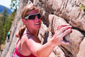 Women rock climbing